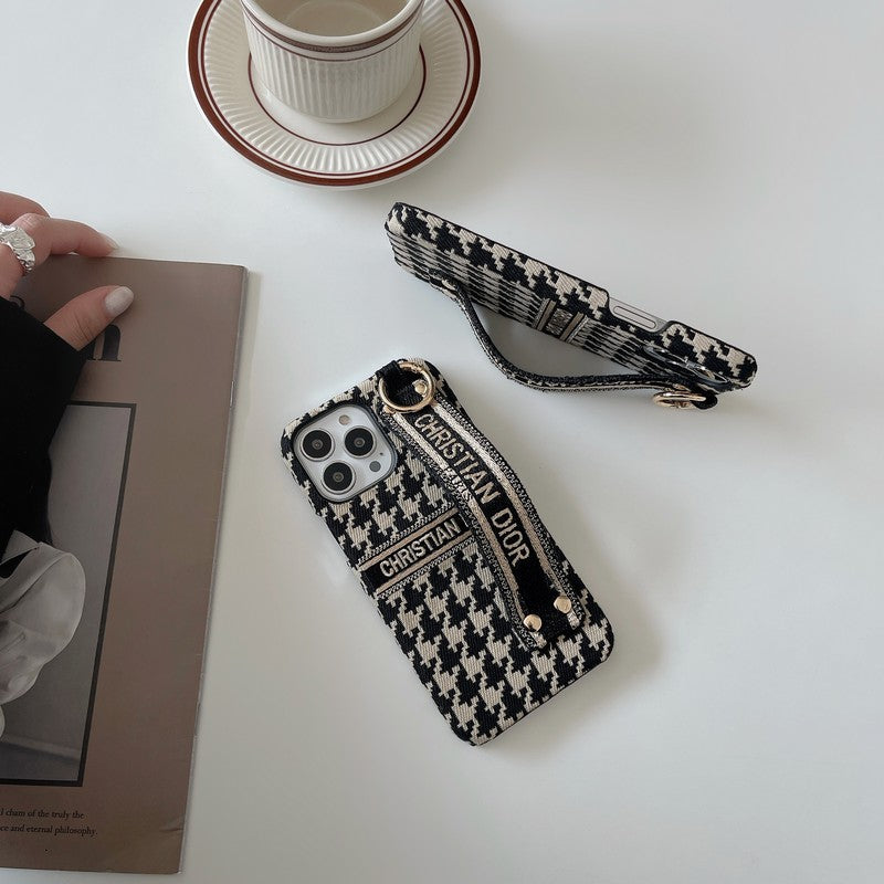 Custodia per iPhone con cinturino alla moda con motivo pied de poule