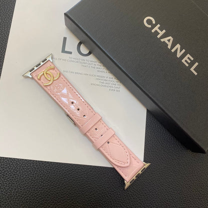 Lesklý kožený řemínek Apple Watch Luxusní kovové logo
