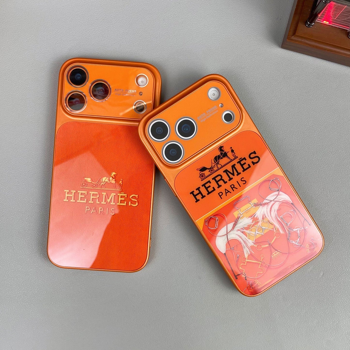 H Luxuriöse iPhone-Hülle aus der Orange-Serie