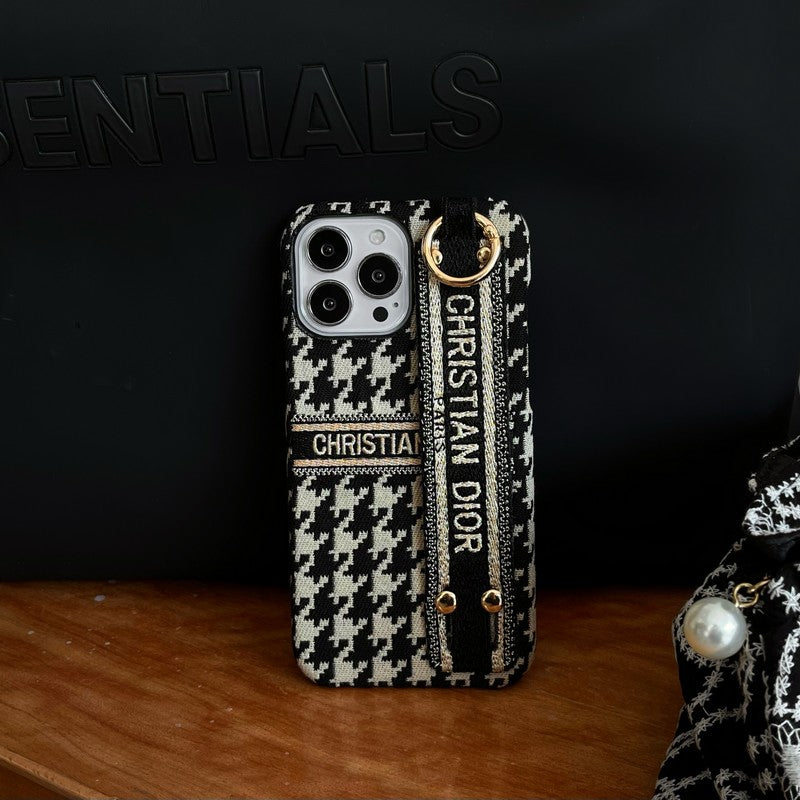 Custodia per iPhone con cinturino alla moda con motivo pied de poule