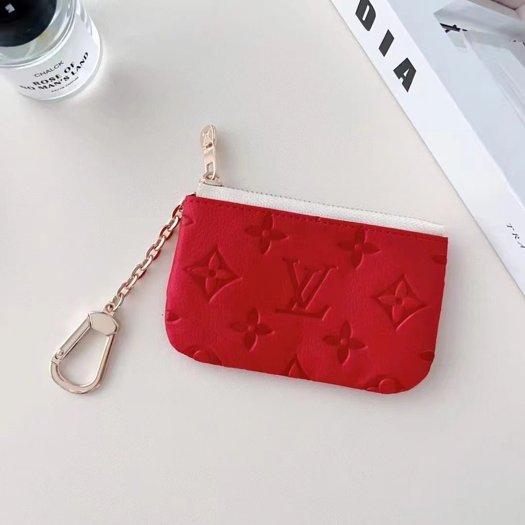 Collezione di portamonete in rilievo di ispirazione colorata con clip a catena