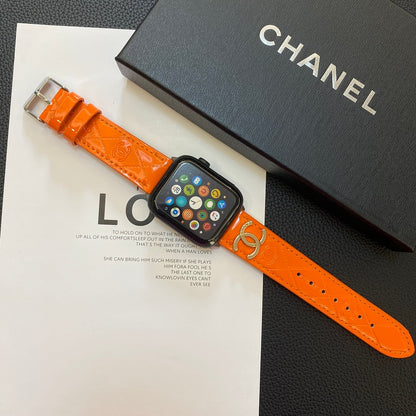 Lesklý kožený řemínek Apple Watch Luxusní kovové logo