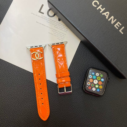 Lesklý kožený řemínek Apple Watch Luxusní kovové logo