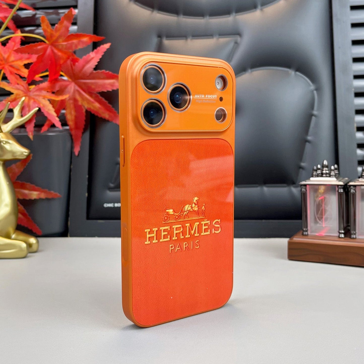H Luxuriöse iPhone-Hülle aus der Orange-Serie