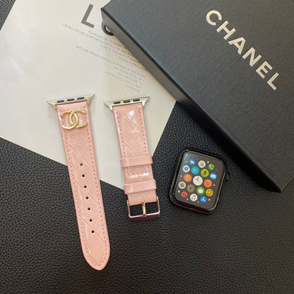Lesklý kožený řemínek Apple Watch Luxusní kovové logo