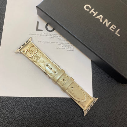 Lesklý kožený řemínek Apple Watch Luxusní kovové logo