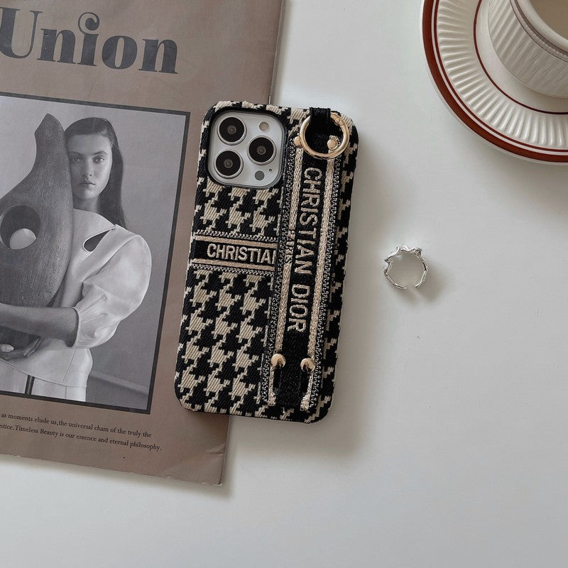 Custodia per iPhone con cinturino alla moda con motivo pied de poule