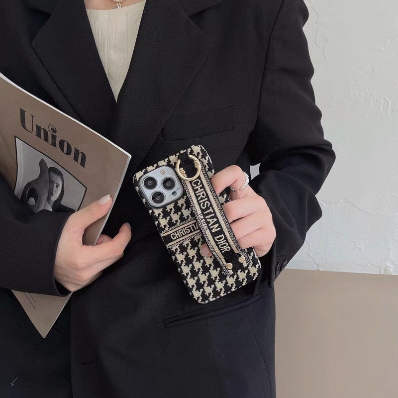 Custodia per iPhone con cinturino alla moda con motivo pied de poule