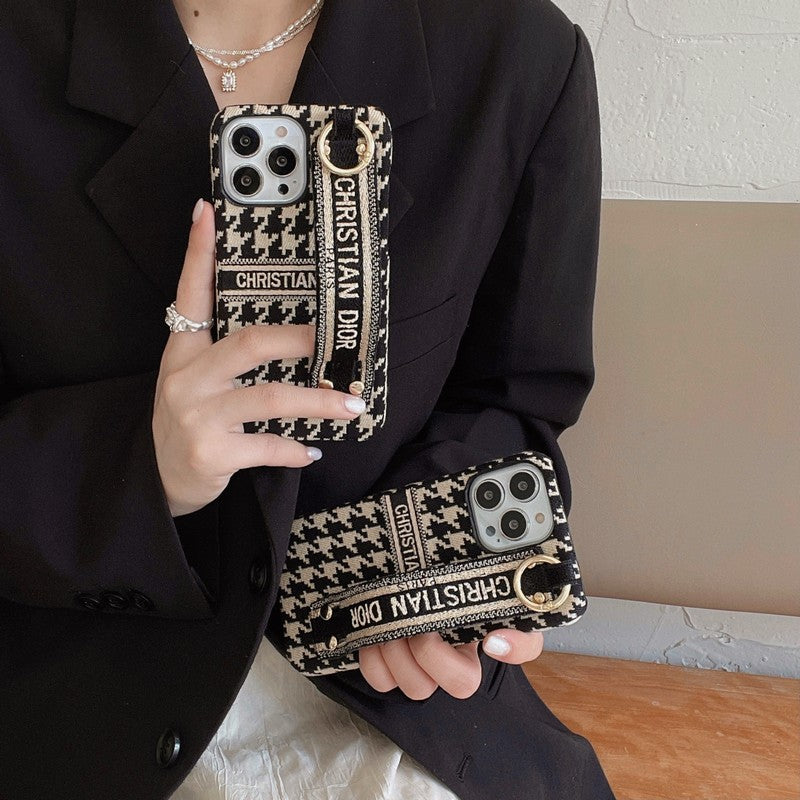 Custodia per iPhone con cinturino alla moda con motivo pied de poule