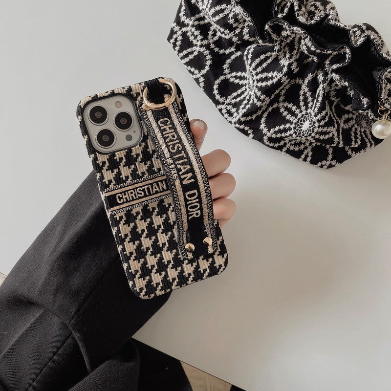 Custodia per iPhone con cinturino alla moda con motivo pied de poule