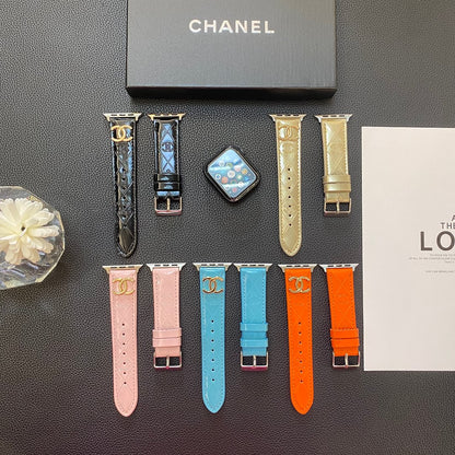 Lesklý kožený řemínek Apple Watch Luxusní kovové logo